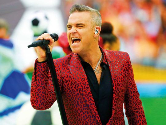 190614 Robbie Williams takes stake in college, sings mentoring’s praises