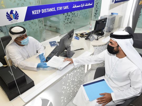 Stock Dubai customs staff at work