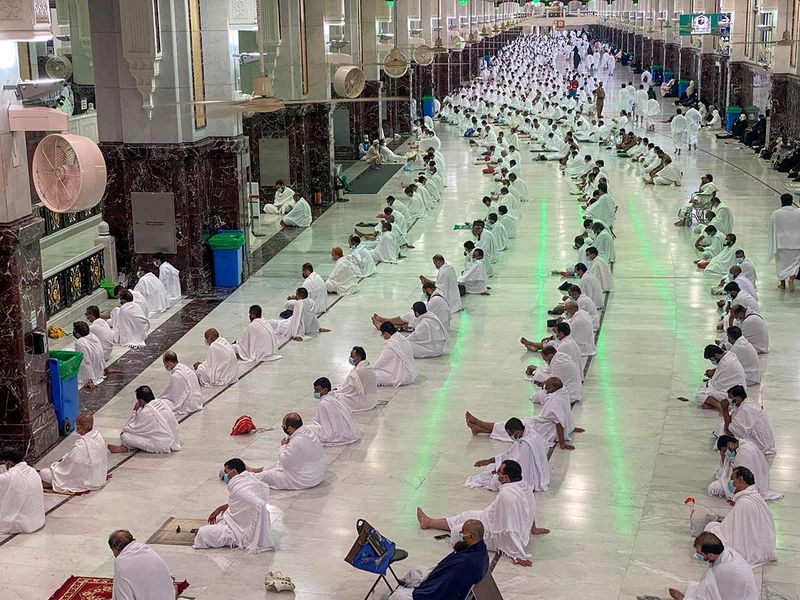 Worshippers perform Friday prayers at the Grand Mosque during Ramadan, in Mecca, Saudi Arabia, April 16, 2021 