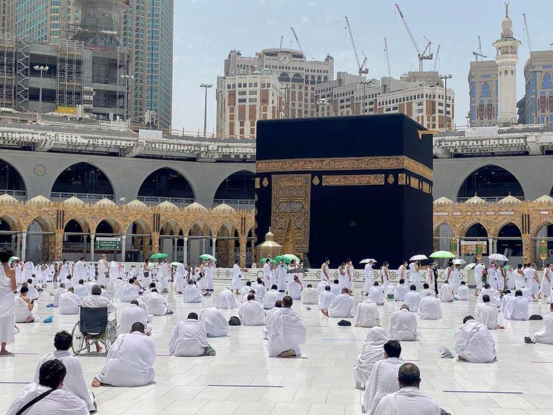 Worshippers pray inside the Grand Mosque in the Saudi holy city of Mecca, during the first Friday prayers of Ramadan, on April 16, 2021. 