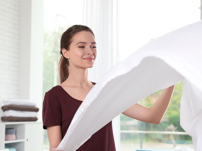 Person drying sheets