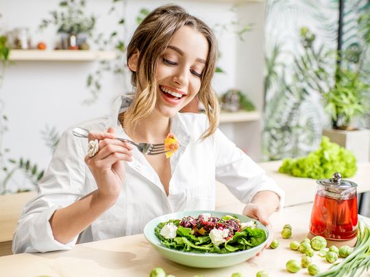 Person eating green diet