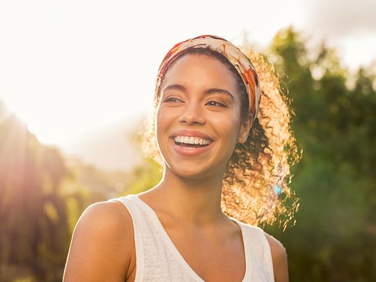 Woman happy in the sun