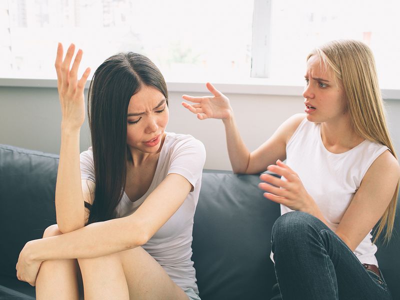 Two girls with money