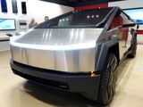 Tesla's new Cybertruck is shown on display at a Tesla store in San Diego, California, U.S., November 20, 2023. REUTERS/Mike Blake/File Photo