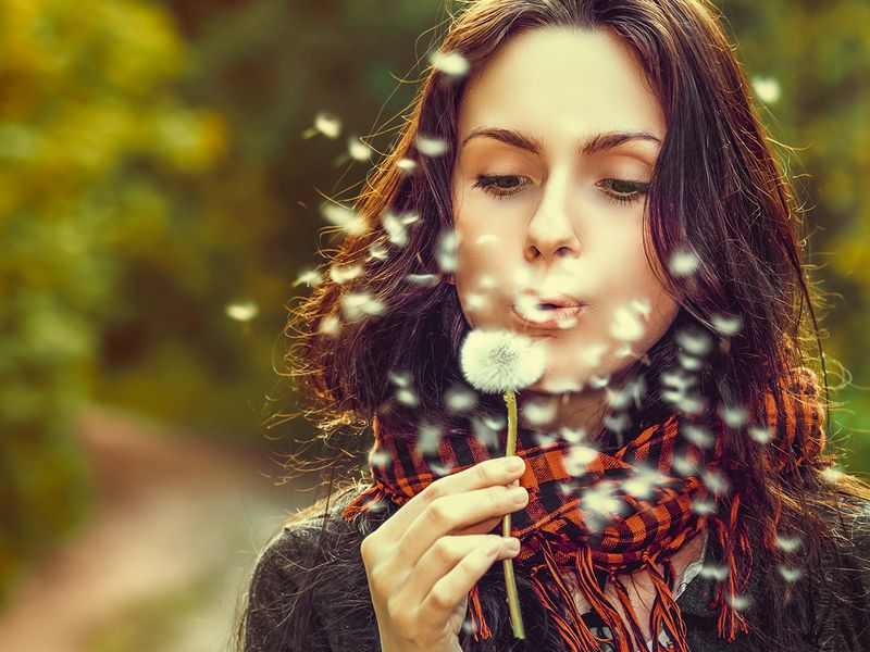 Woman with dandelions