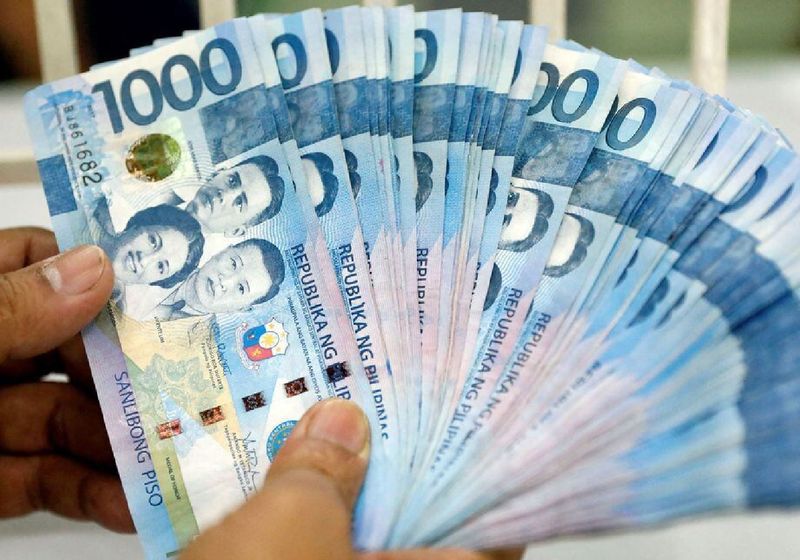 Philippine peso bills inside a money changer in metro Manila