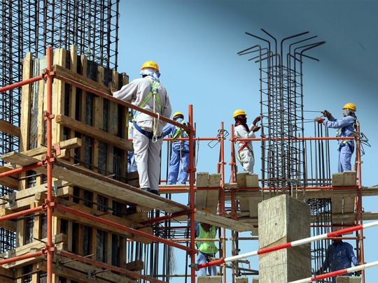 construction workers, labourers at work