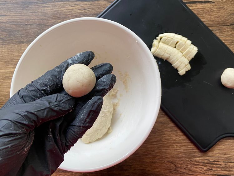 Knead the dough for a couple of minutes or until the dough forms a smooth ball.