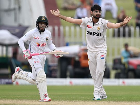 Pakistan's Abrar Ahmed (R) makes an unsuccessful leg before wicket appeal 